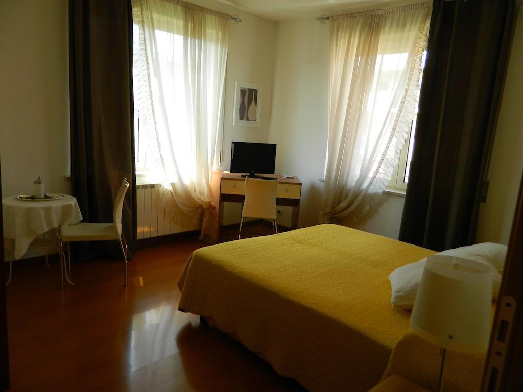 Casa Vacanze Le Terrazze Verona Szoba fotó